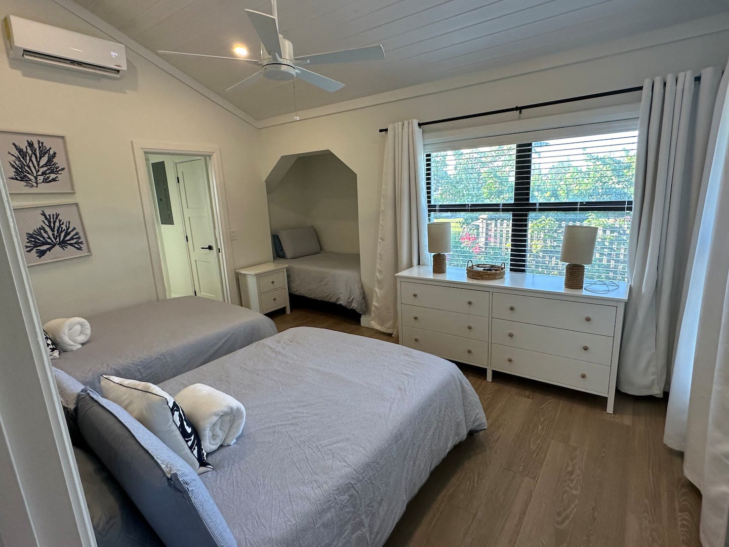 Bedroom with three twin beds